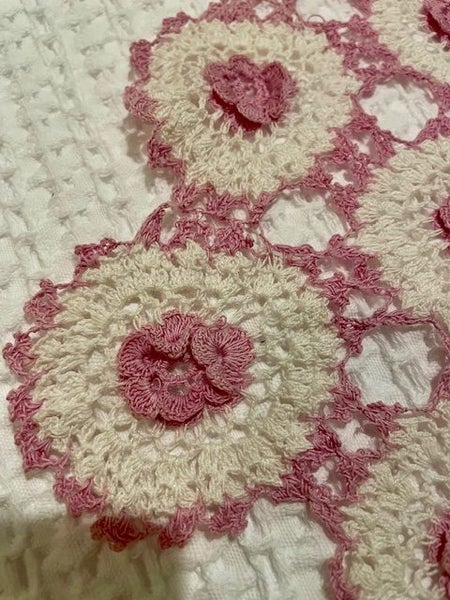 A lovely hand crocheted pink & white doily with raised flowers Carousel 2
