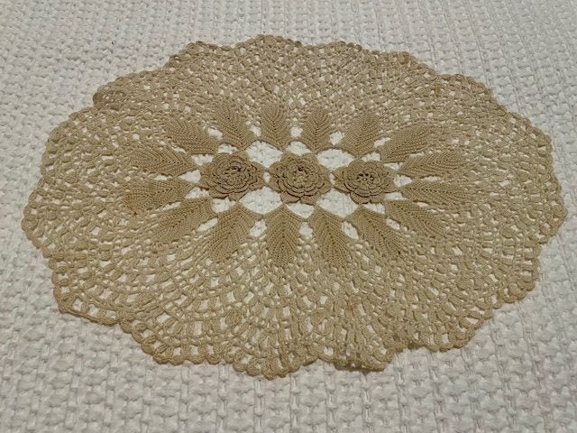 A perfect hand crocheted Doily with raised flowers Carousel 1