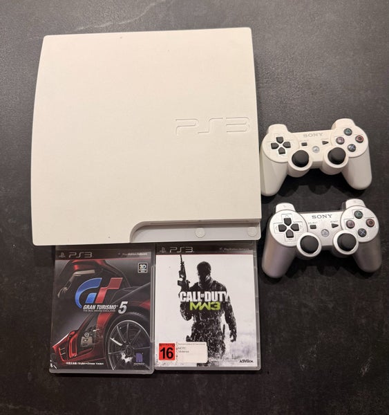 Rare White PlayStation 3 PS3 with two controllers & 2 games63928136586626110