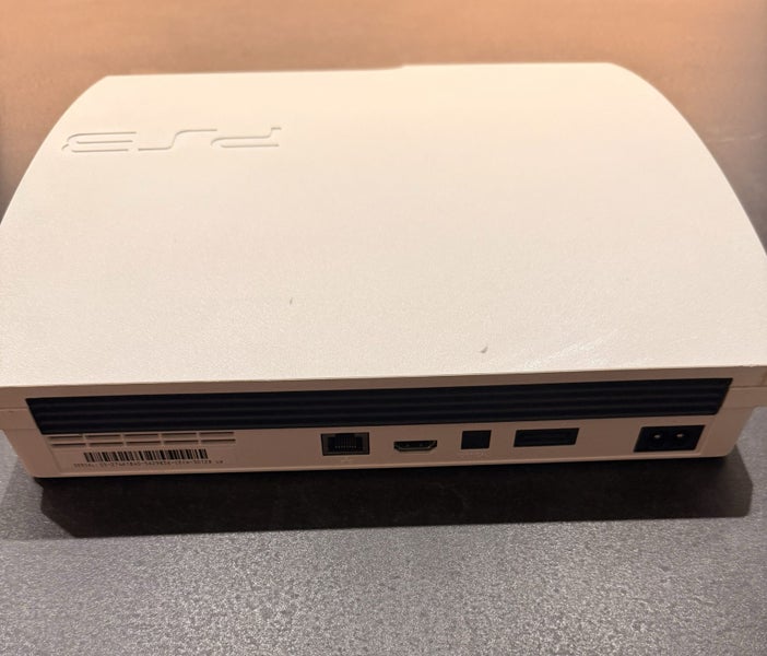 Rare White PlayStation 3 PS3 with two controllers & 2 games63928136586626111