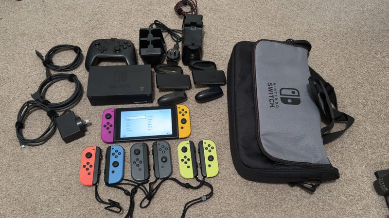 Nintendo Switch V1 Console + Accessories Carousel 1