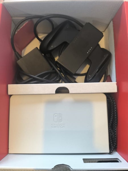 Nintendo Switch OLED + Handheld Grip Carousel 2