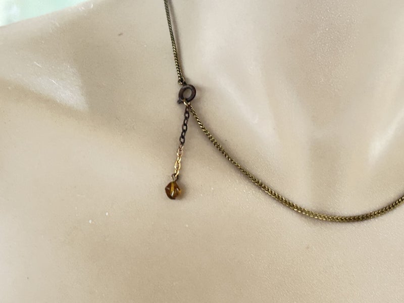 Vintage Gilded Brass filigree necklace with golden amber-toned czech crystals Carousel 4