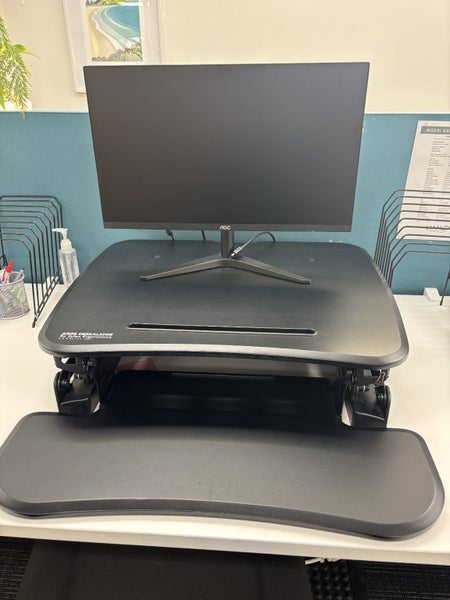 Make any desk a stand-up desk! Arise Deskalator Height Adjustable Stand Carousel 2