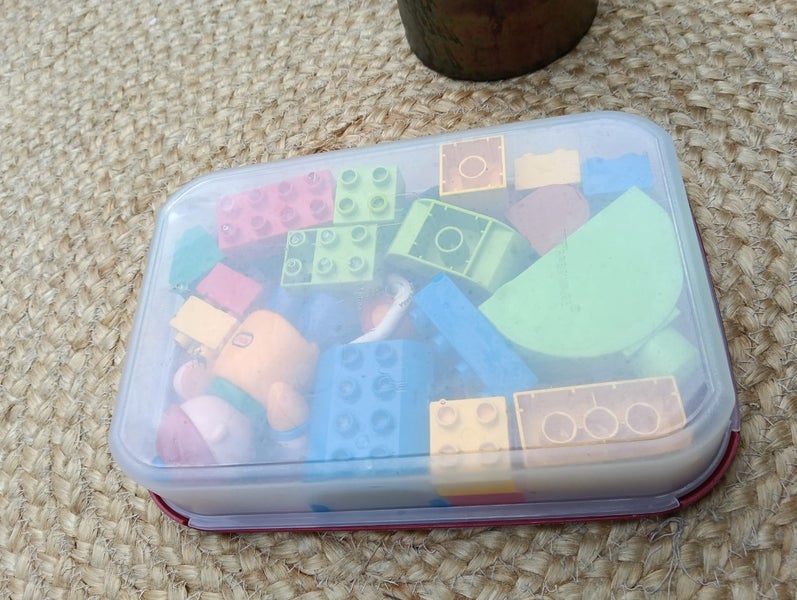 Tolo Toys Schoolboy & rattle & Lego Duplo in Tupperware Carousel 7