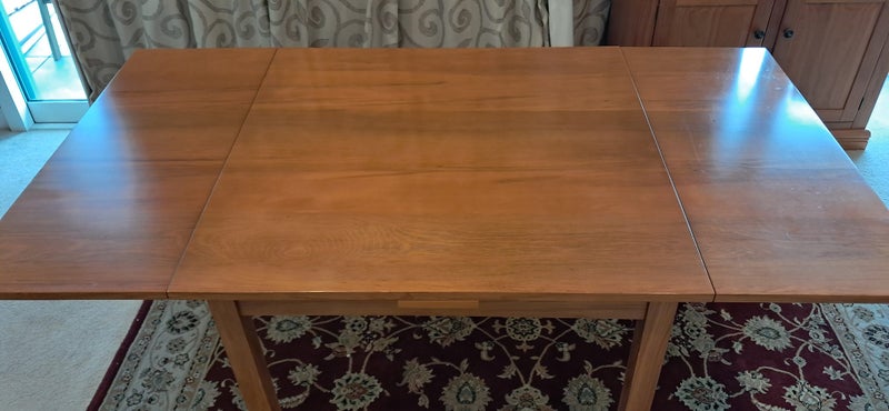 Small square extendable rimu dining table - suit apartment63895294159234113