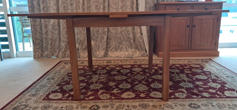 Small square extendable rimu dining table - suit apartment63895294159234112