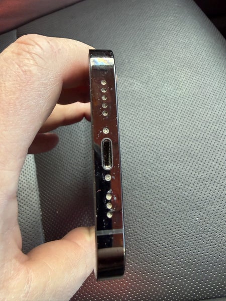 iPhone 14 Pro with quad lock case63899135072643112