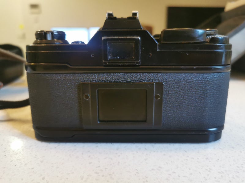 Canon AE-1 with power slider, flash and 24mm lens63902550036353111