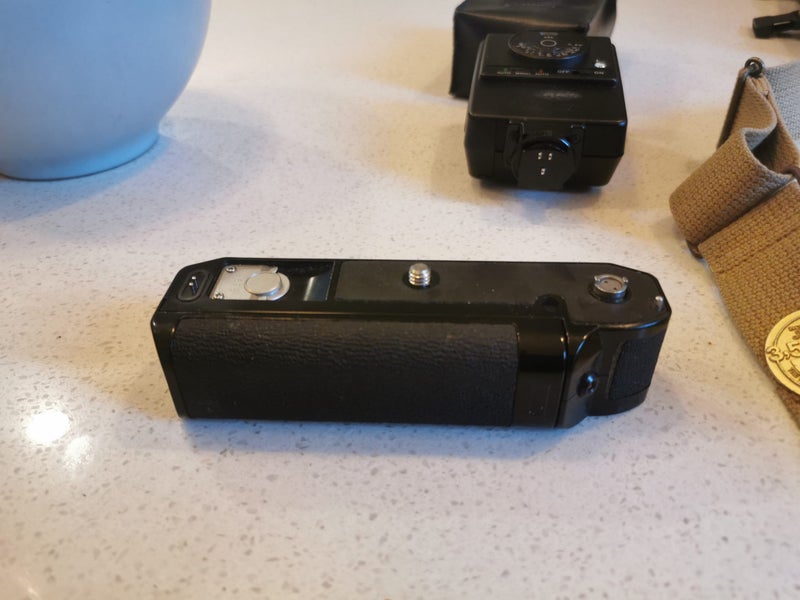 Canon AE-1 with power slider, flash and 24mm lens63902550036353113