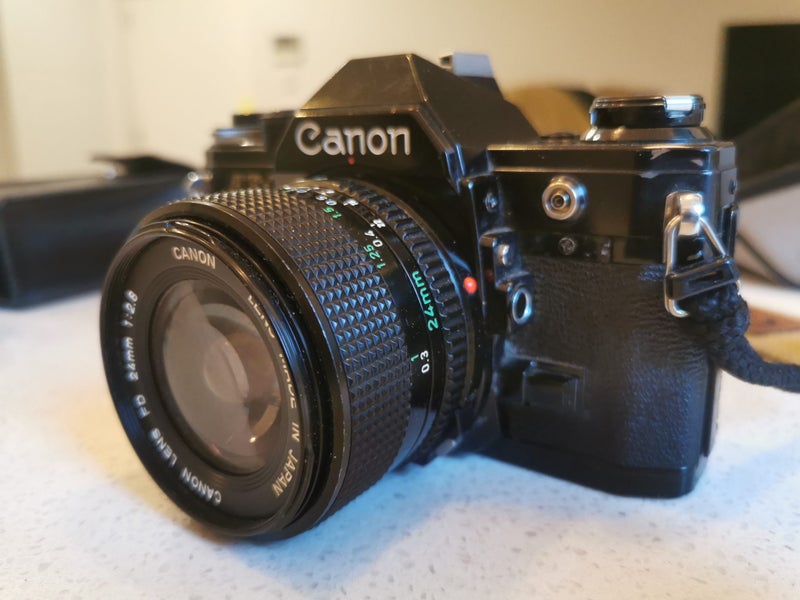 Canon AE-1 with power slider, flash and 24mm lens63902550036353110