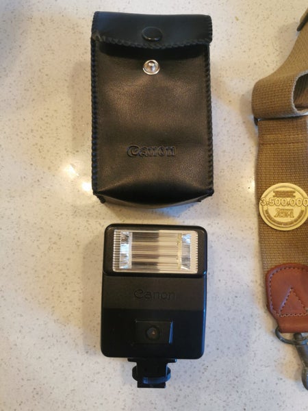 Canon AE-1 with power slider, flash and 24mm lens63902550036353112