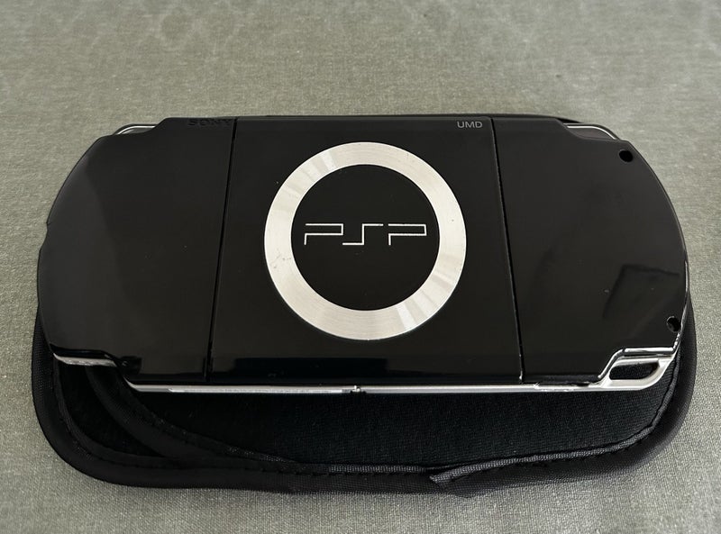 PSP 2000 – Piano Black | 64GB | Fully Set Up Carousel 3