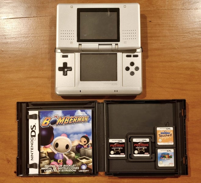 Nintendo DS + 3 Games Carousel 1