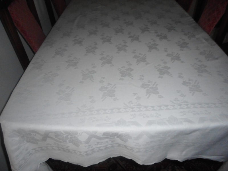 very large white patterned scalloped edged damask linen tablecloth Carousel 1
