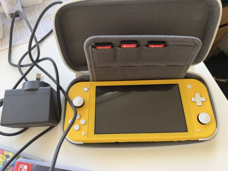Nintendo Switch lite- with games Carousel 4