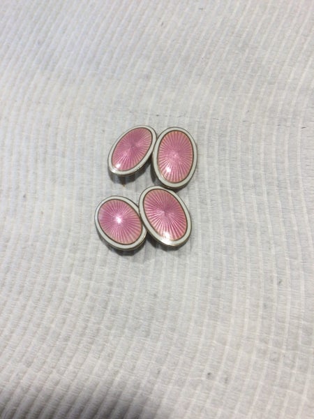 A RARE PAIR OF ART DECO ENAMELLED STERLING SILVER CUFFLINKS Carousel 1