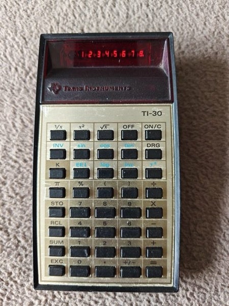 Texas Instruments TI-30 Scientific calculator Carousel 1