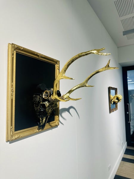 Hand carved deer skull mounted to frame Carousel 4