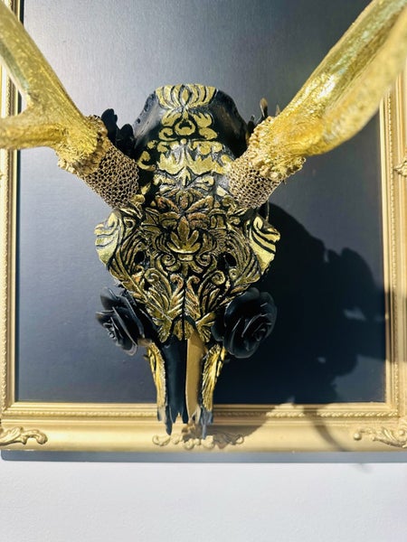 Hand carved deer skull mounted to frame Carousel 1