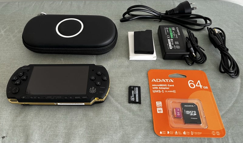 PSP 3000 – Monster Hunter Edition (Gold & Black) | 64 GB | Fully Set Up63950070606339110