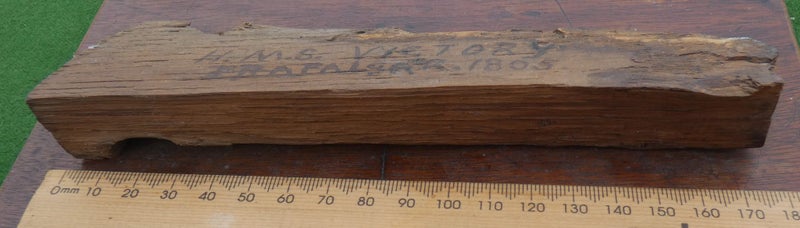 A mounted small section of (Battle-damaged?) OAK from H.M.S. VICTORY dated 180563950891846275112