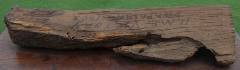 A mounted small section of (Battle-damaged?) OAK from H.M.S. VICTORY dated 180563950891846275113
