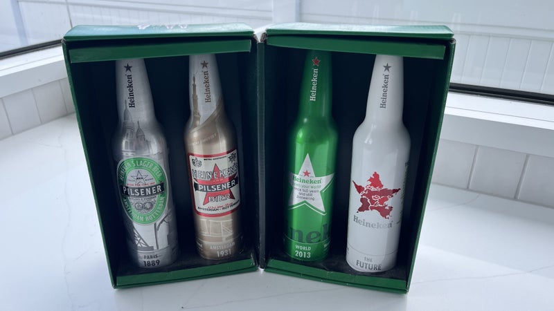 Original Heineken beer collectors bottles 1889 1931 2013 and future Carousel 1
