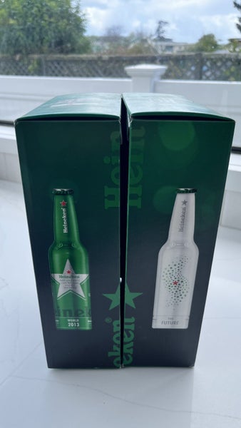 Original Heineken beer collectors bottles 1889 1931 2013 and future Carousel 2