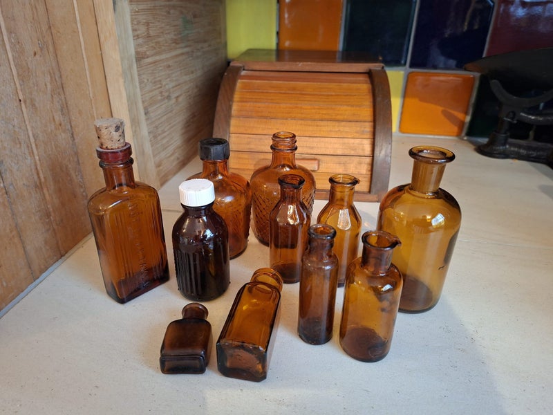 Bulk lot of Amber Vintage Medical bottles. Carousel 2
