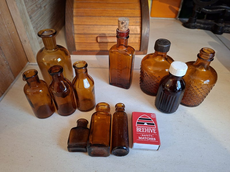 Bulk lot of Amber Vintage Medical bottles. Carousel 1