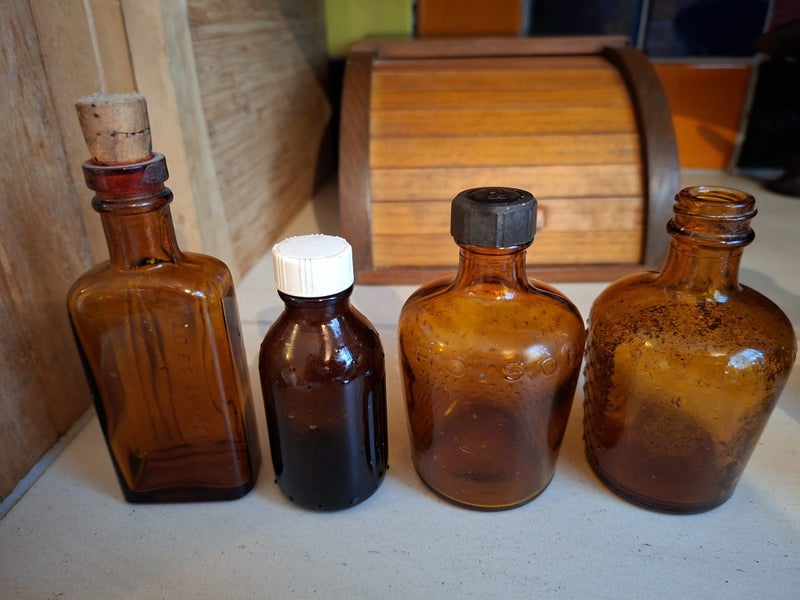Bulk lot of Amber Vintage Medical bottles. Carousel 9