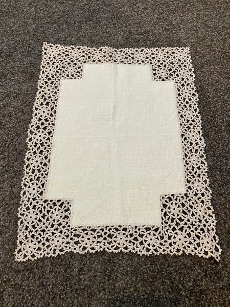 A lovely vintage linen cloth with a deep hand crocheted edging Carousel 1