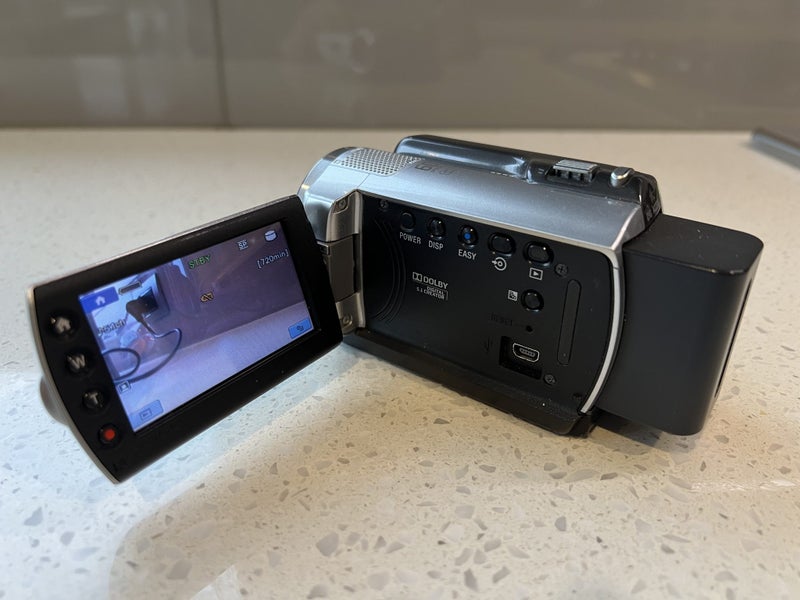 Sony Handycam DCR-SR67E 80GB, HDD 60X Optical Zoom, Up to 61 hrs Recording Carousel 2