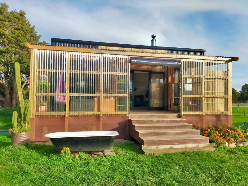 Fully Off-Grid Modern 2 Bedroom Tiny House + Enclosed Deck + Solar Package Carousel 1