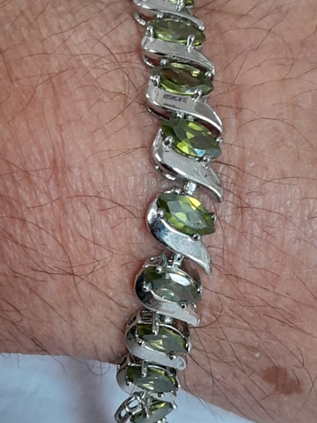 Fancy bracelet with faceted green stones Carousel 1