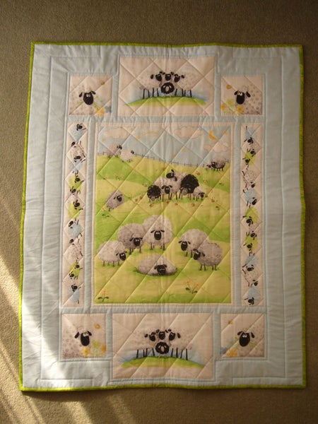 Cot Quilt - Sean the Sheep Carousel 1