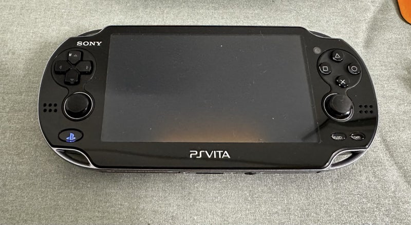 PS Vita – PCH-1100 (OLED Model) | 64GB | Fully Set Up64312680112515111