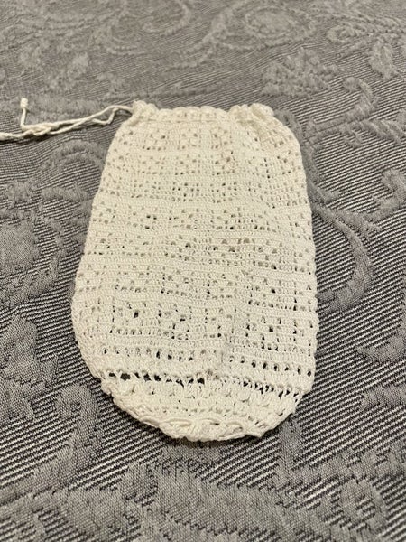 The sweetest little pure white hand crocheted drawstring bag Carousel 1
