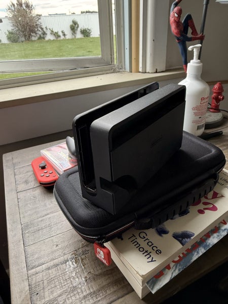 OLED Nintendo Switch with Game Carousel 8