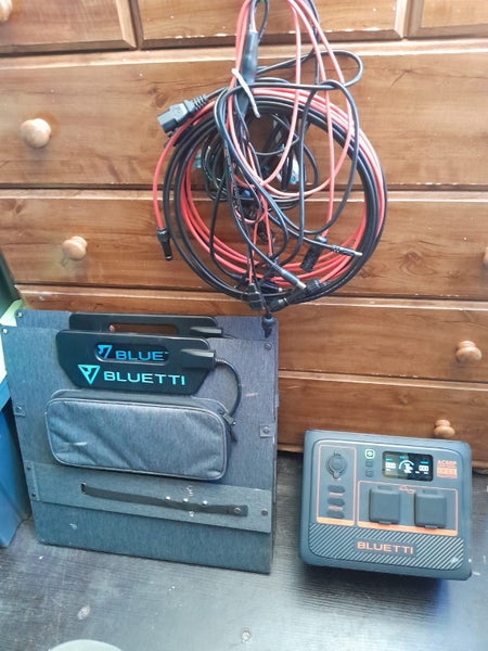 bluetti power pack and 2 solar panels Carousel 1