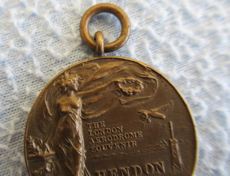 Brass medal/souvenir. "London Aerodrome Souvenir" Carousel 2