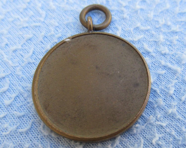 Brass medal/souvenir. "London Aerodrome Souvenir" Carousel 11