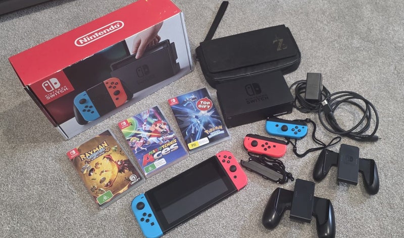 Nintendo Switch with Docking Station & More! Carousel 1