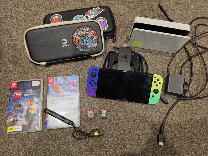 Nintendo Switch OLED Spaltoon console + games Carousel 1