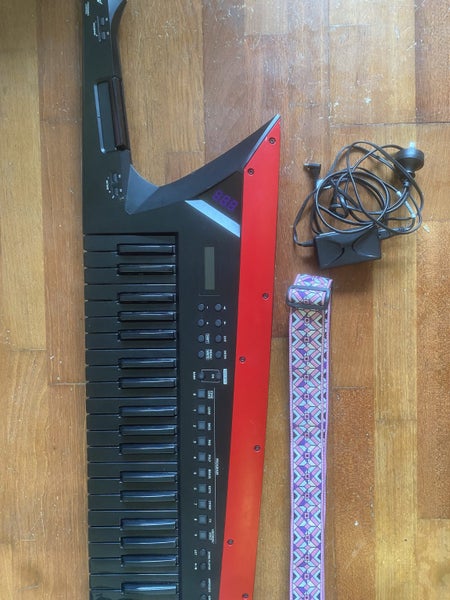 ROLAND AX EDGE KEYTAR SYNTH 49 KEY - BLACK64006822198274110