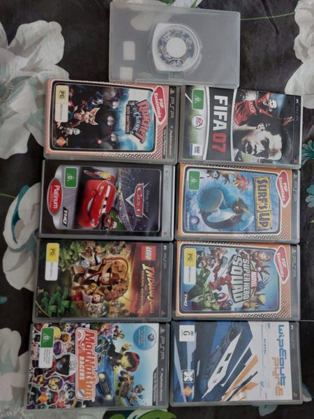PSP, original charger, 4GB storage card and 9 Games Carousel 6
