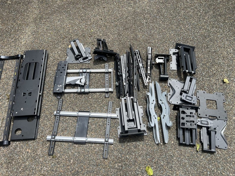 5 boxes of assorted Metal wall TV bracket mountings OVER $1000+ WORTH Carousel 1