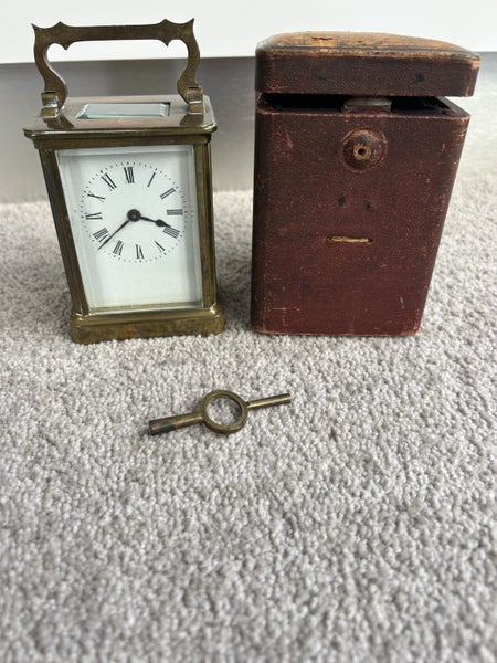 Carriage clock with original case and key Carousel 1