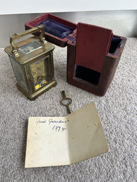 Carriage clock with original case and key Carousel 2